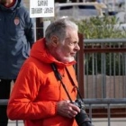 Claude E.